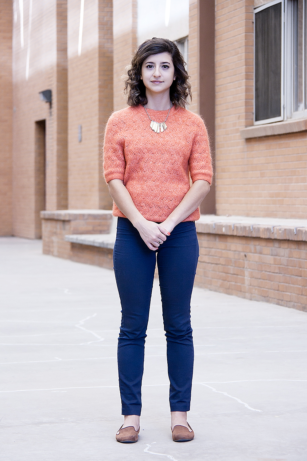 Hannah Shamloo standing in a sunlit courtyard on the ASU campus.